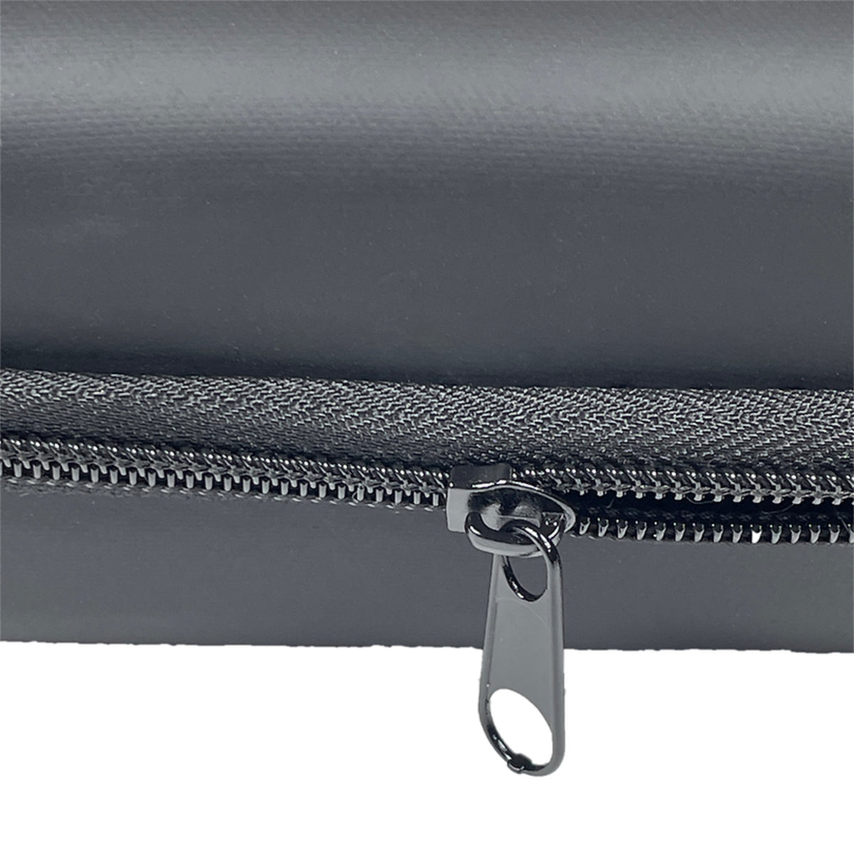 Close-up of a gray zippered pouch with a metal zipper on a white background