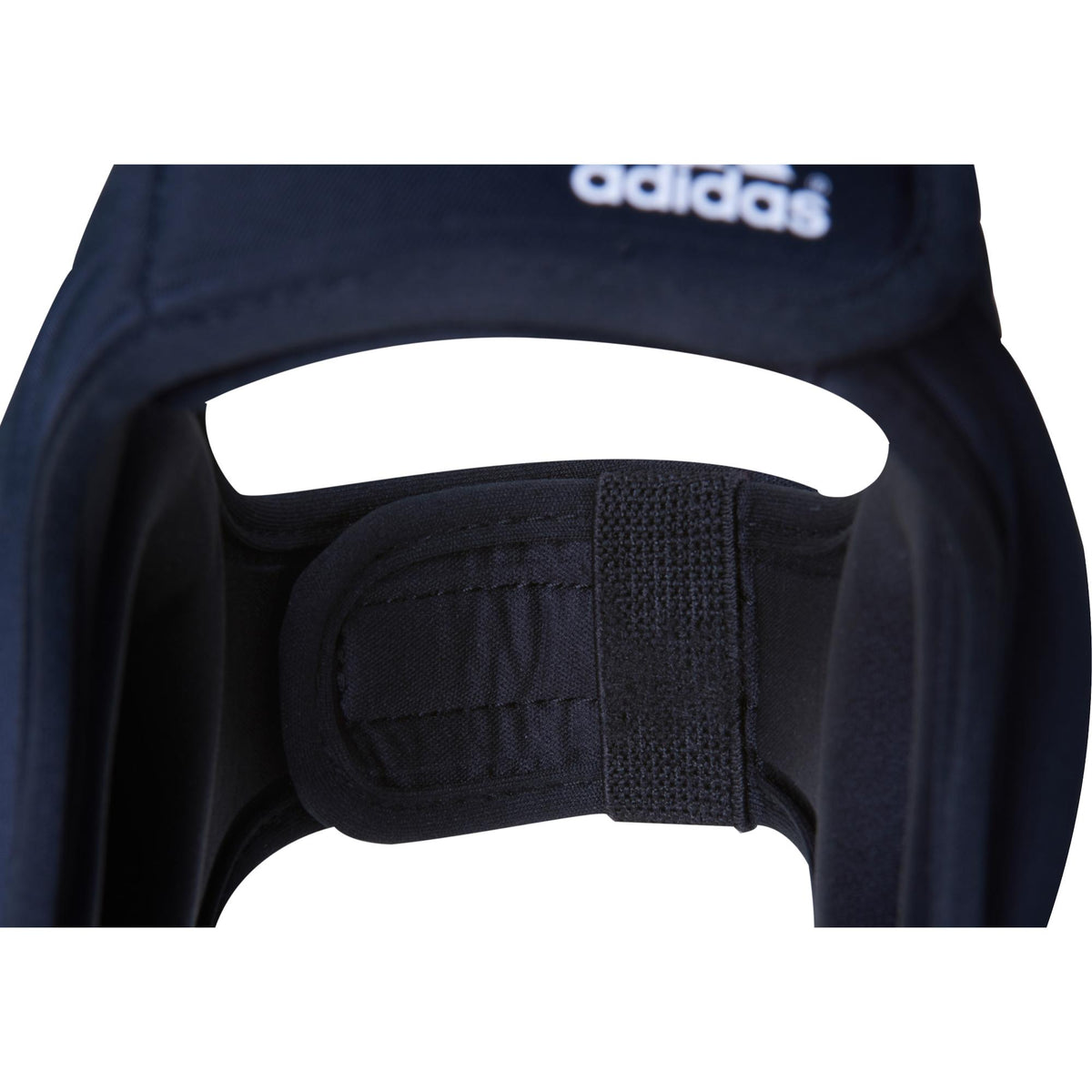 Adidas wrestling headgear with adjustable chin strap and padded ear protection, front view