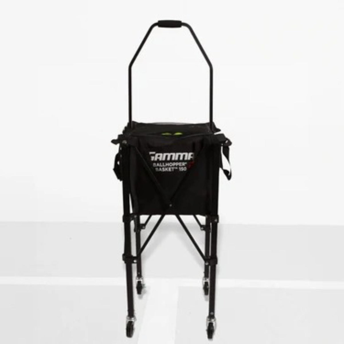 Portable ball hopper basket with fabric storage compartment, carry handles, and a standing frame for easy transport and access during practice.