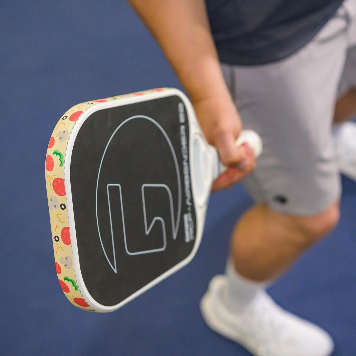 Pickleball paddle edge guard tape with fun food-themed patterns designed to protect paddle edges from wear and damage.