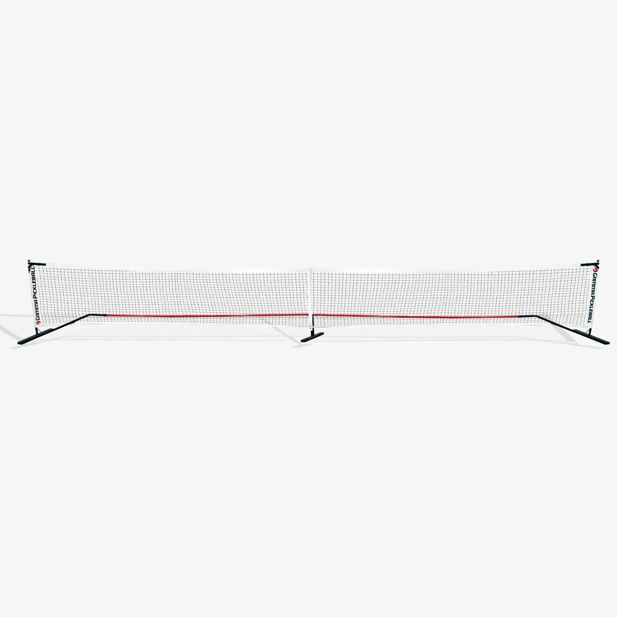 Portable pickleball net system with mesh netting and a stable frame designed for easy setup on a court.