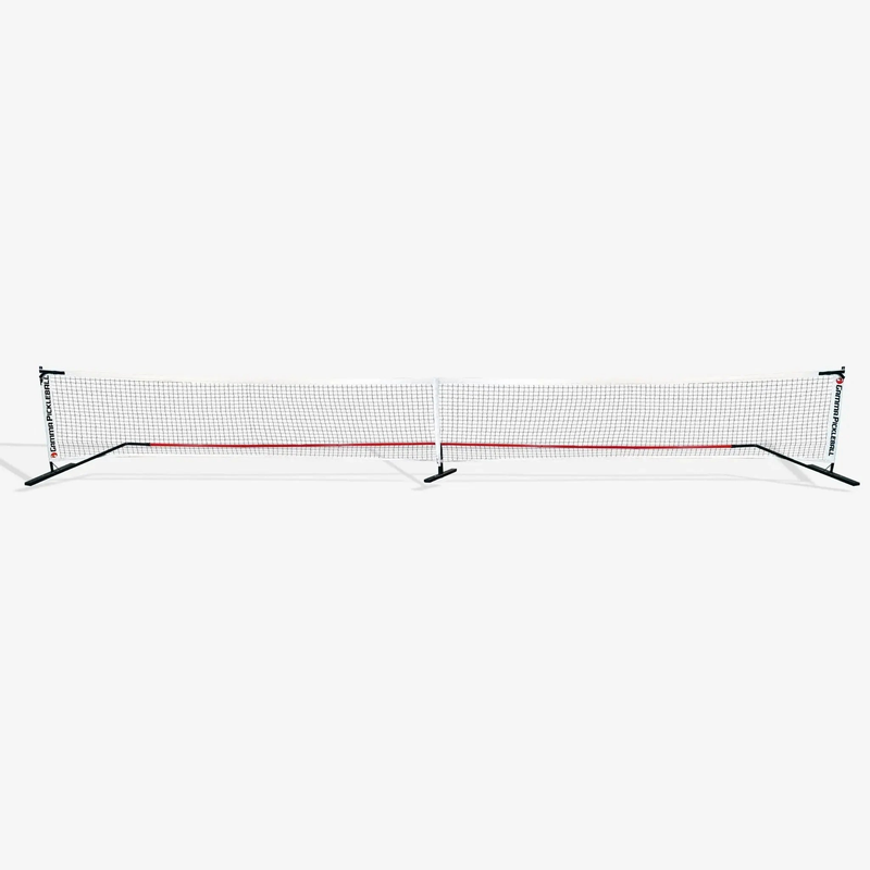 Portable pickleball net system with mesh netting and a stable frame designed for easy setup on a court.