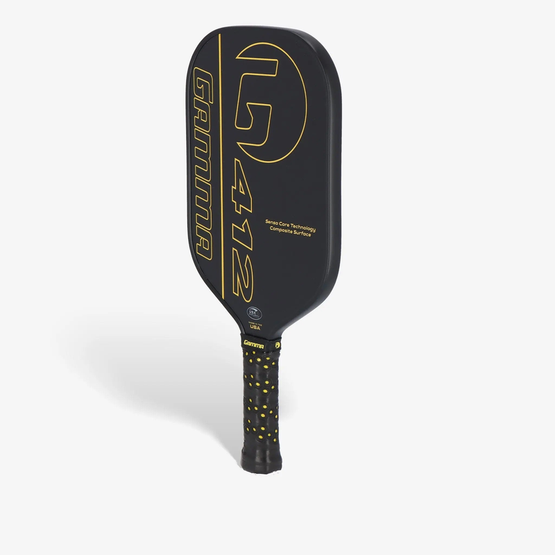 Pickleball paddle with a wide rectangular face, textured hitting surface, and cushioned grip handle featuring a bold graphic design on the front.