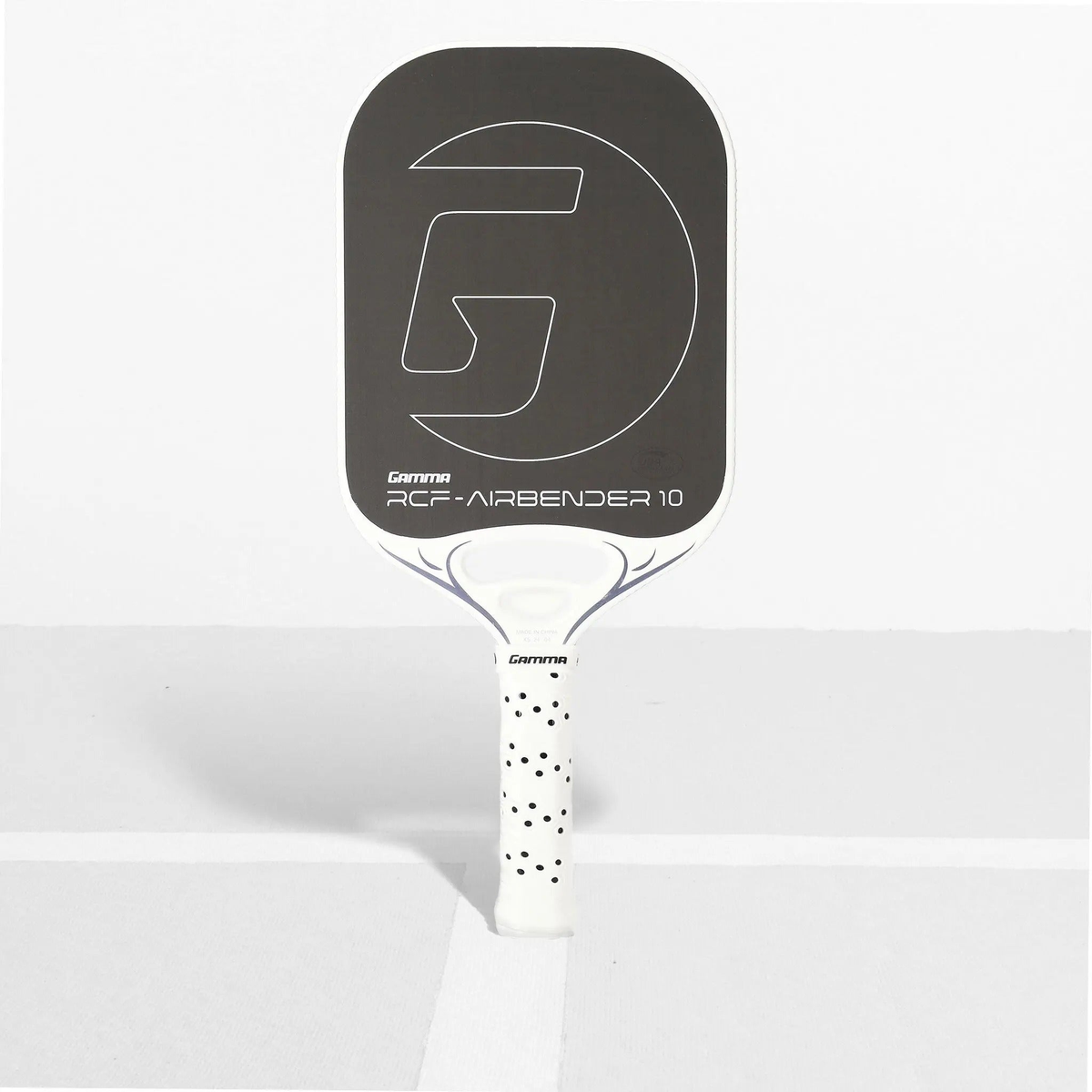 Pickleball paddle with a rectangular face, smooth hitting surface, large graphic logo, and a perforated cushioned grip handle.