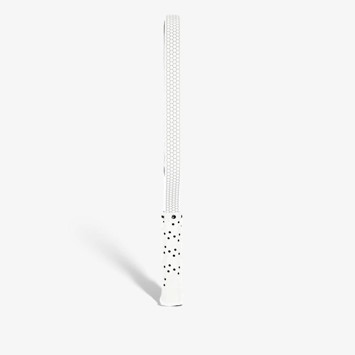 Pickleball paddle with an elongated face design, textured hitting surface, and cushioned perforated grip handle for improved control and comfort.
