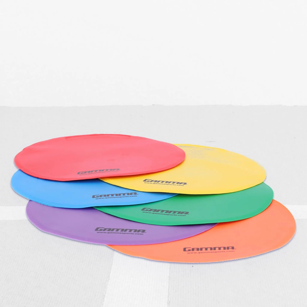 Flat court marker discs designed for training and drills, providing visual targets and positioning guides on playing surfaces.
