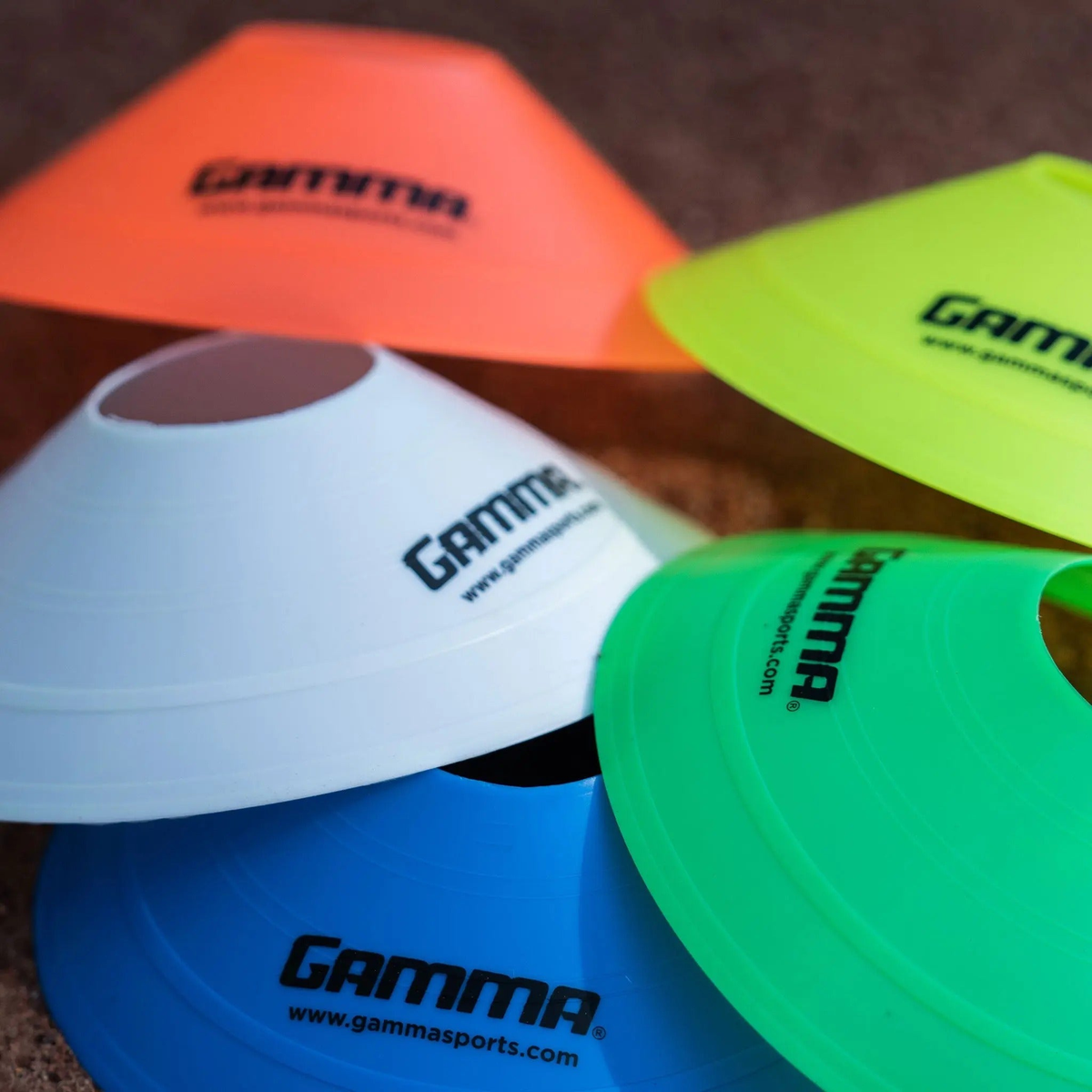 Set of low-profile disc cones used for training drills and marking boundaries on courts or fields.