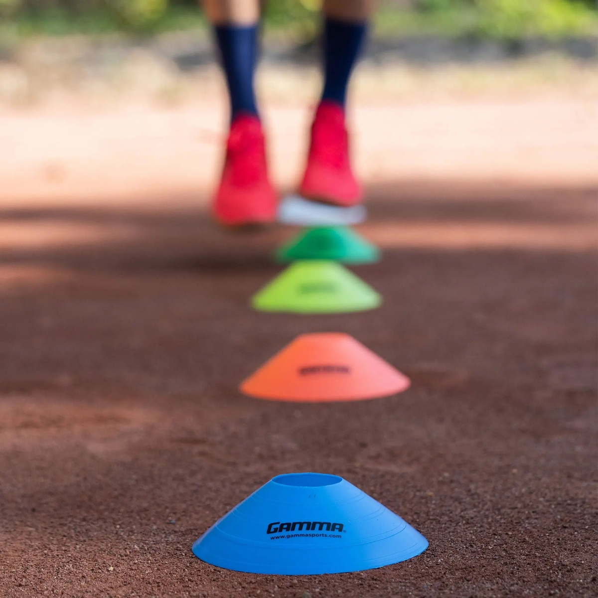 Set of low-profile disc cones used for training drills and marking boundaries on courts or fields.