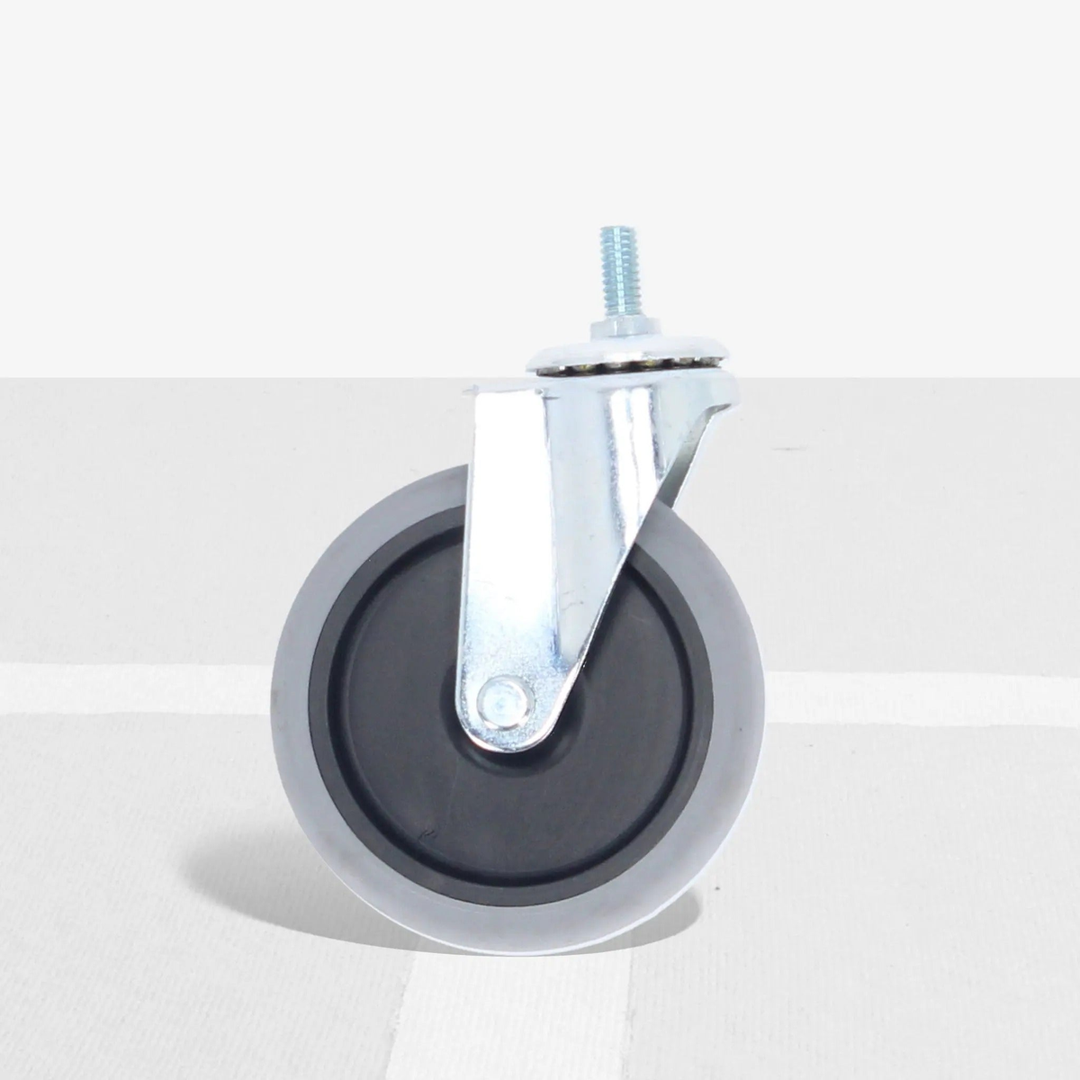 Replacement caster wheel with smooth rolling design and metal mounting bracket for travel cart mobility.