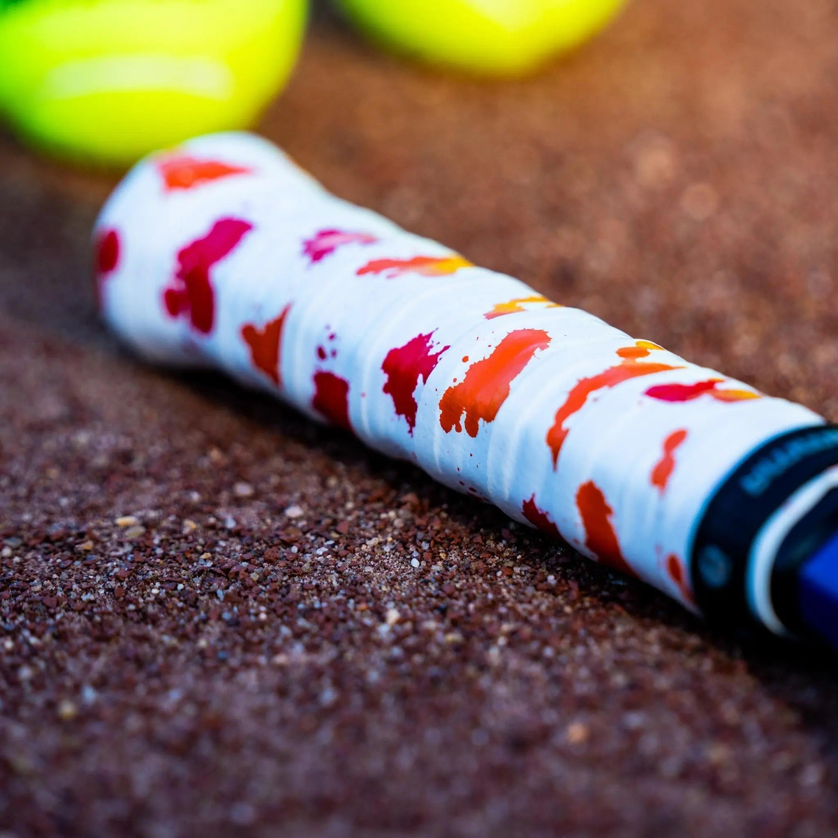 Pack of overgrips featuring a tropical-themed pattern with tacky surface for improved grip and control on racquet handles.