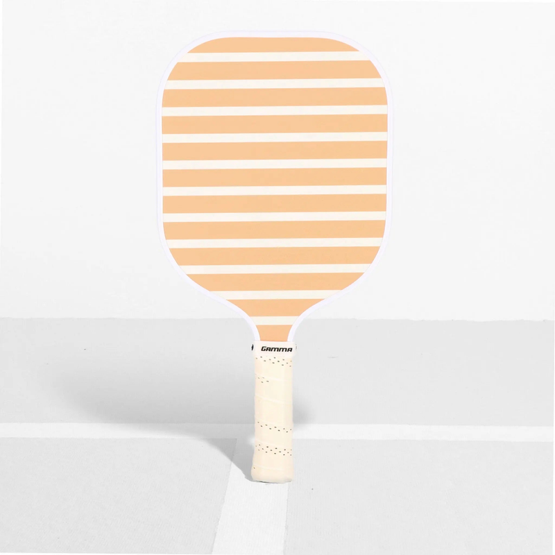 Pickleball paddle with a wide face, striped surface design, and cushioned grip handle for improved control and comfort.