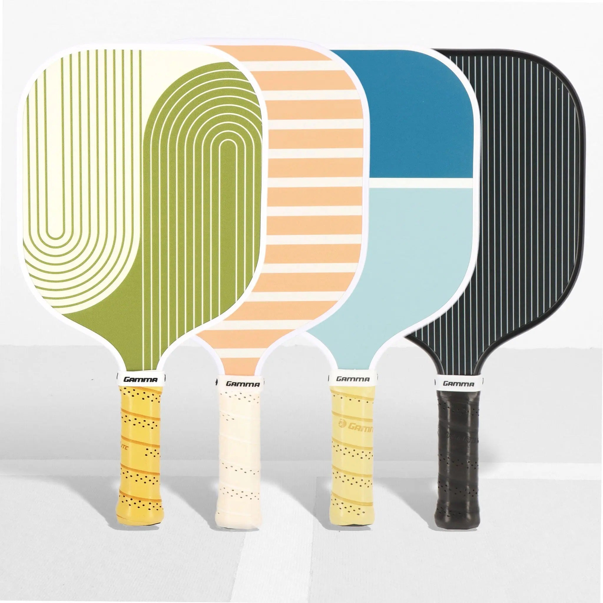 Pickleball paddle with a wide face, striped surface design, and cushioned grip handle for improved control and comfort.