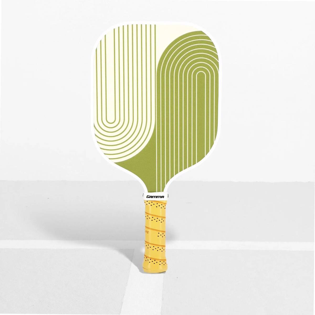 Pickleball paddle with a wide face, striped surface design, and cushioned grip handle for improved control and comfort.