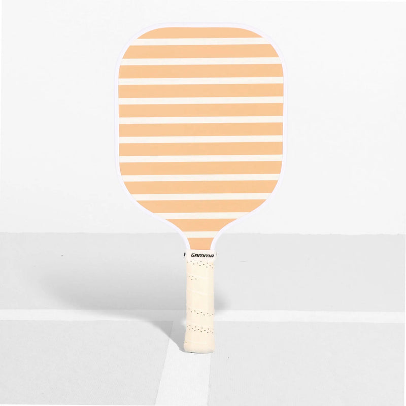 Pickleball paddle with a wide face, striped surface design, and cushioned grip handle for improved control and comfort.