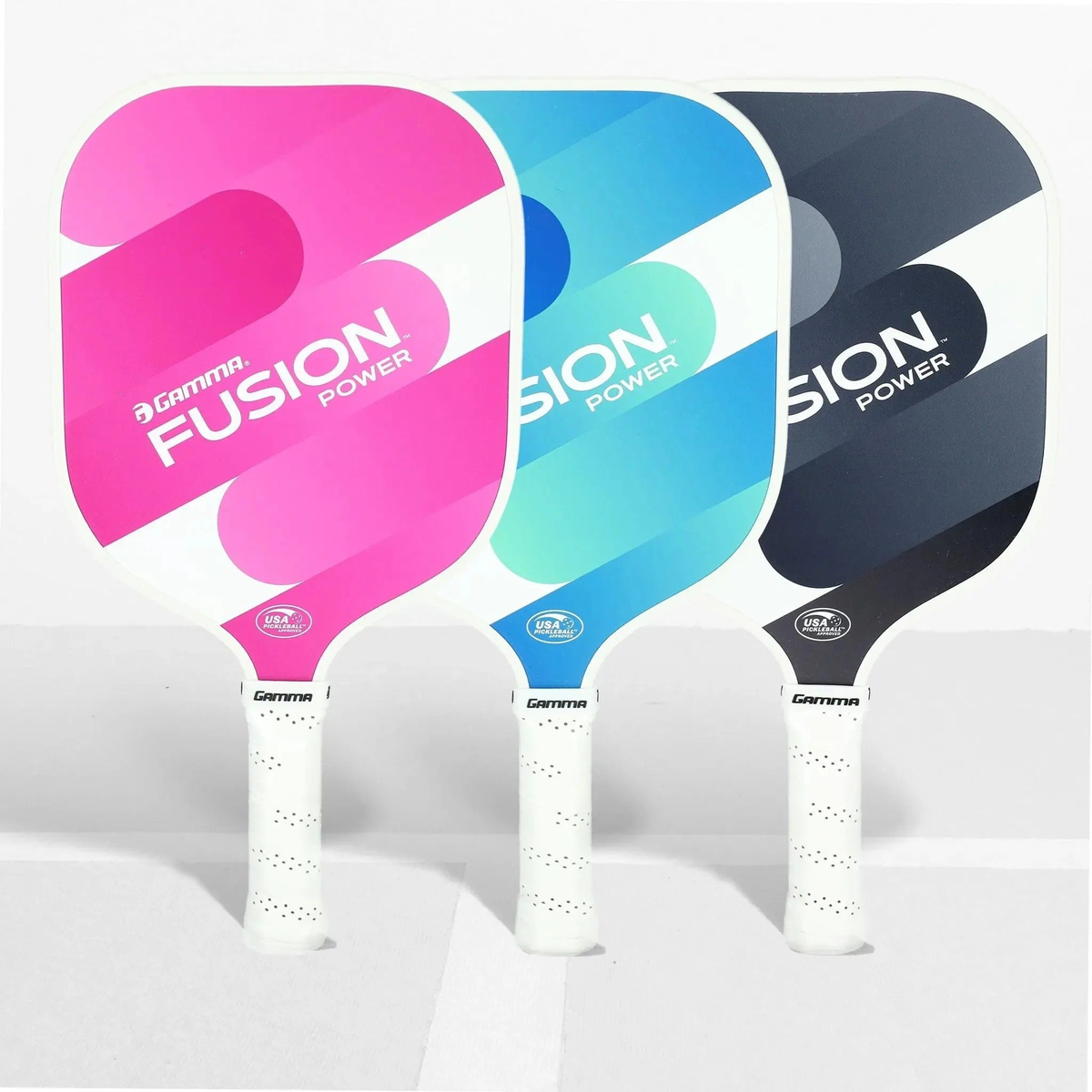 Pickleball paddle with a wide rounded face, smooth graphic design, and cushioned grip handle for enhanced power and control.