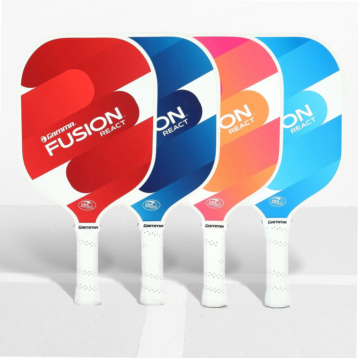 Set of pickleball paddles with wide faces, smooth graphic designs, and cushioned grip handles for responsive control and performance.