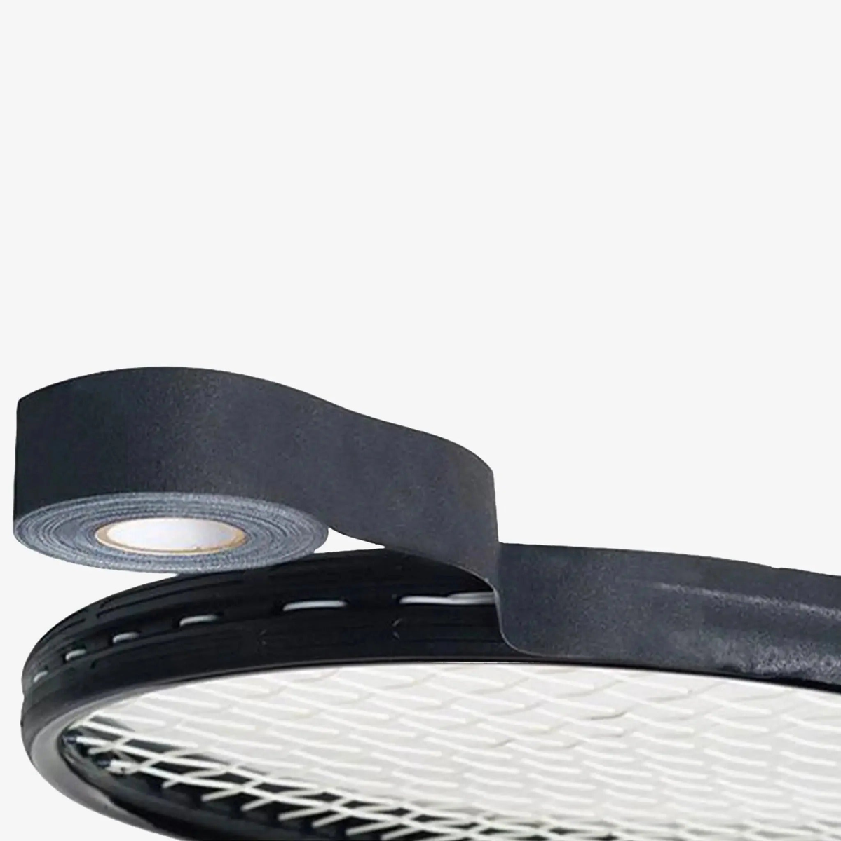 Packaged roll of racquet head protection tape designed to guard against wear and damage on racquet frames.