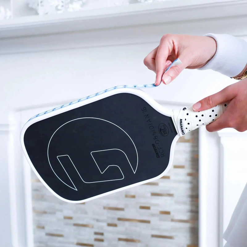 Pickleball paddle edge guard tape with a decorative pattern, designed to protect the paddle edge from wear and damage.