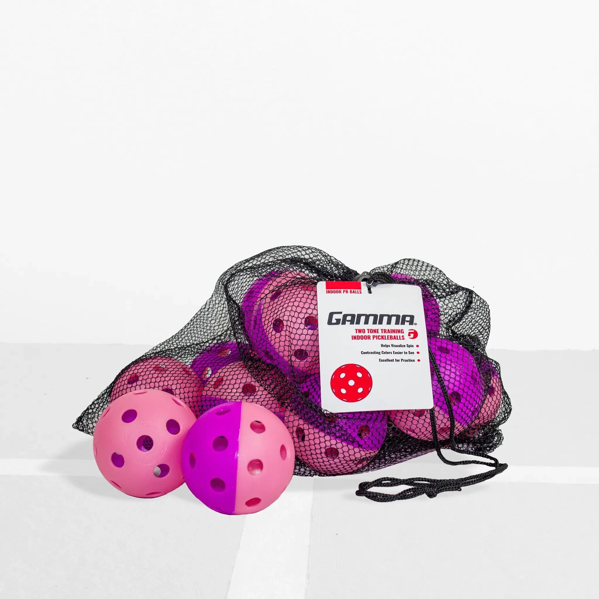 Indoor training pickleball with a two-piece design and evenly spaced holes, built for controlled play and consistent bounce during practice.