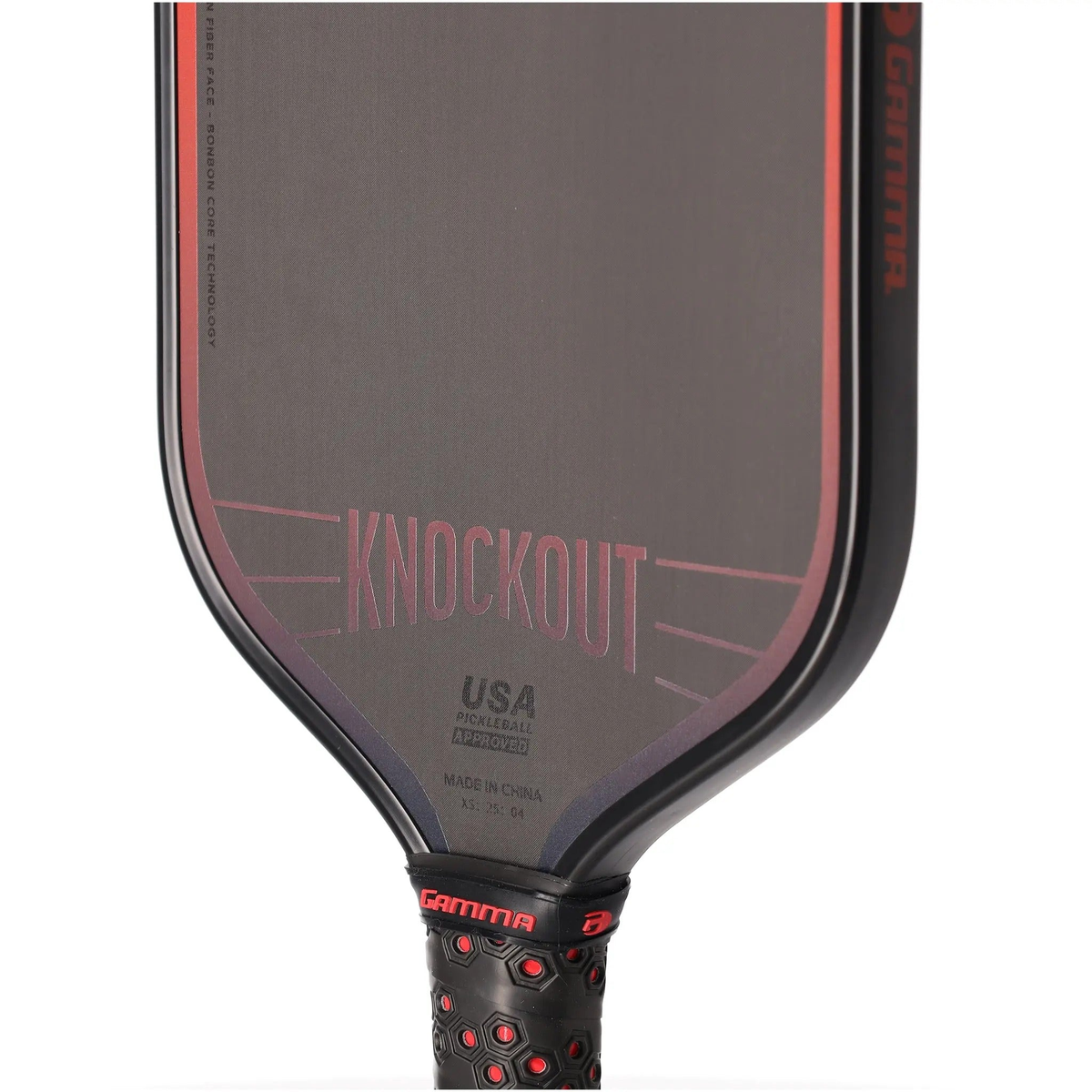 Pickleball paddle with a sleek solid face and cushioned handle, designed for power and control during gameplay.