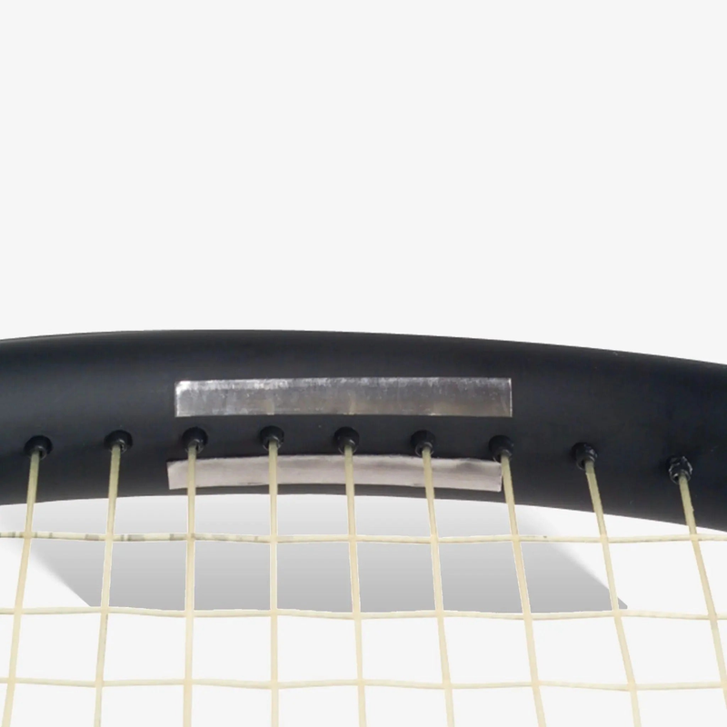 Packaged racquet lead tape strip designed for adding weight and customizing balance, presented in retail packaging.