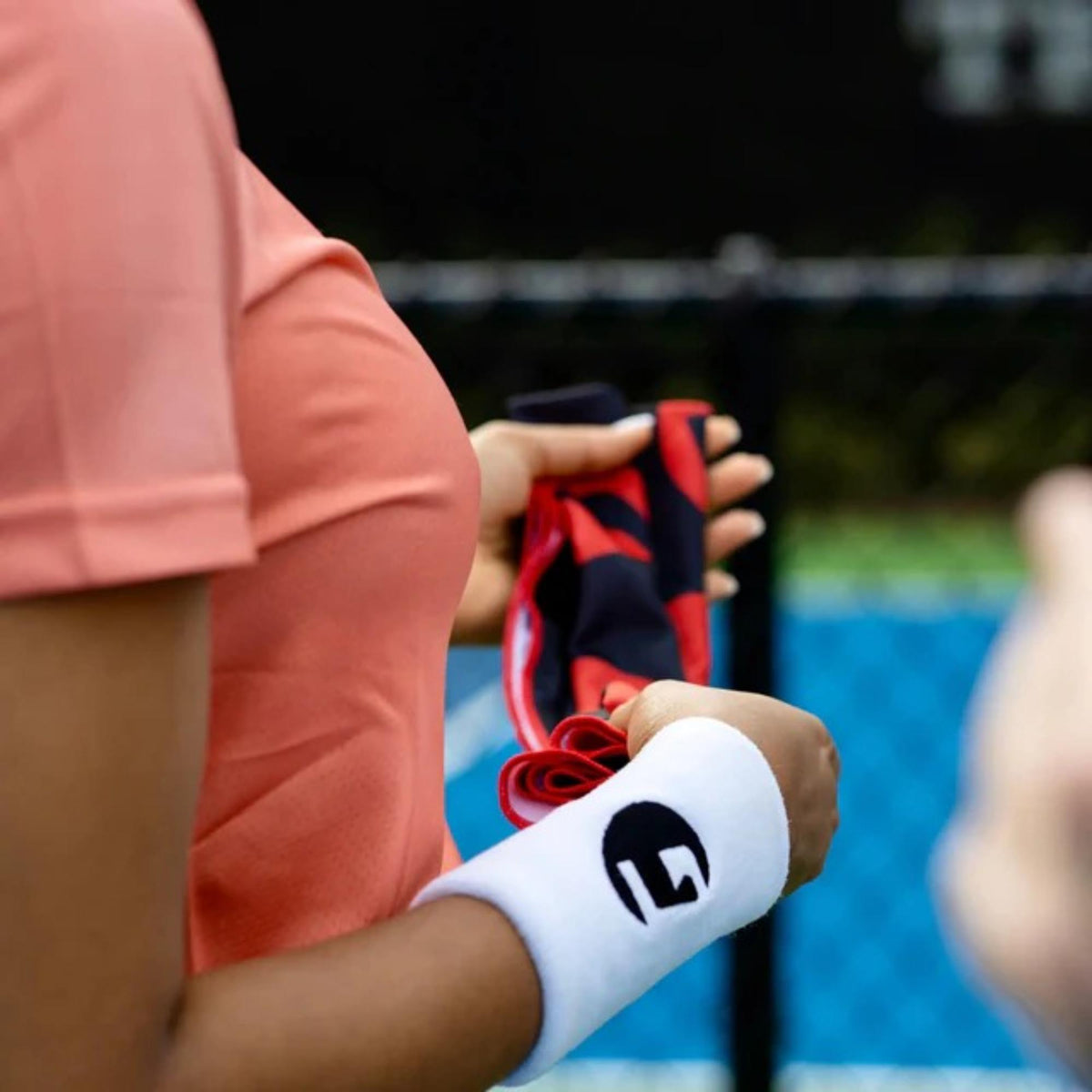 Packaged microfiber cooling towel designed to absorb moisture and provide long-lasting cooling during sports or outdoor activities.