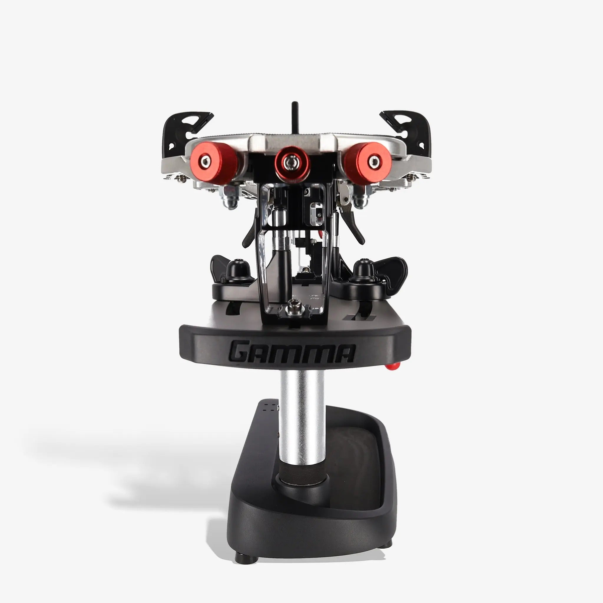 Manual spring tension stringing machine with a base platform, rotating turntable, mounting supports, and a tensioning mechanism with hand crank for securing and stringing racquets.