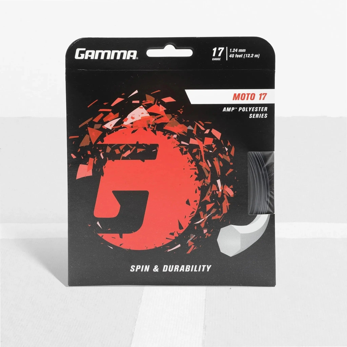 Packaged polyester tennis string set with branded card backing and visible coiled string segment, designed for spin and durability performance.