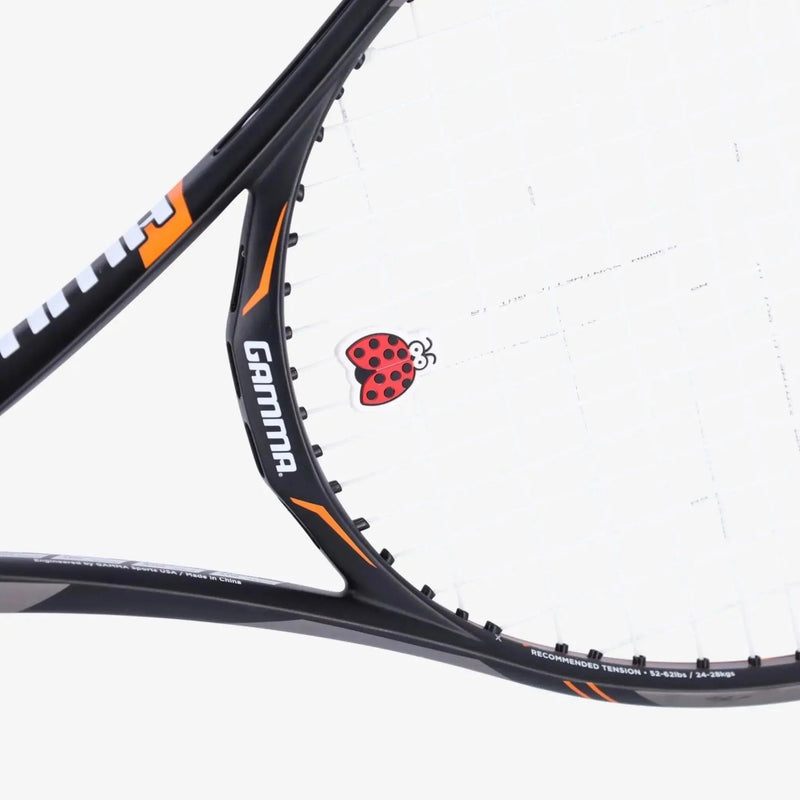 Box of assorted tennis dampeners featuring nature-themed shapes, designed to reduce vibration on racquet strings.