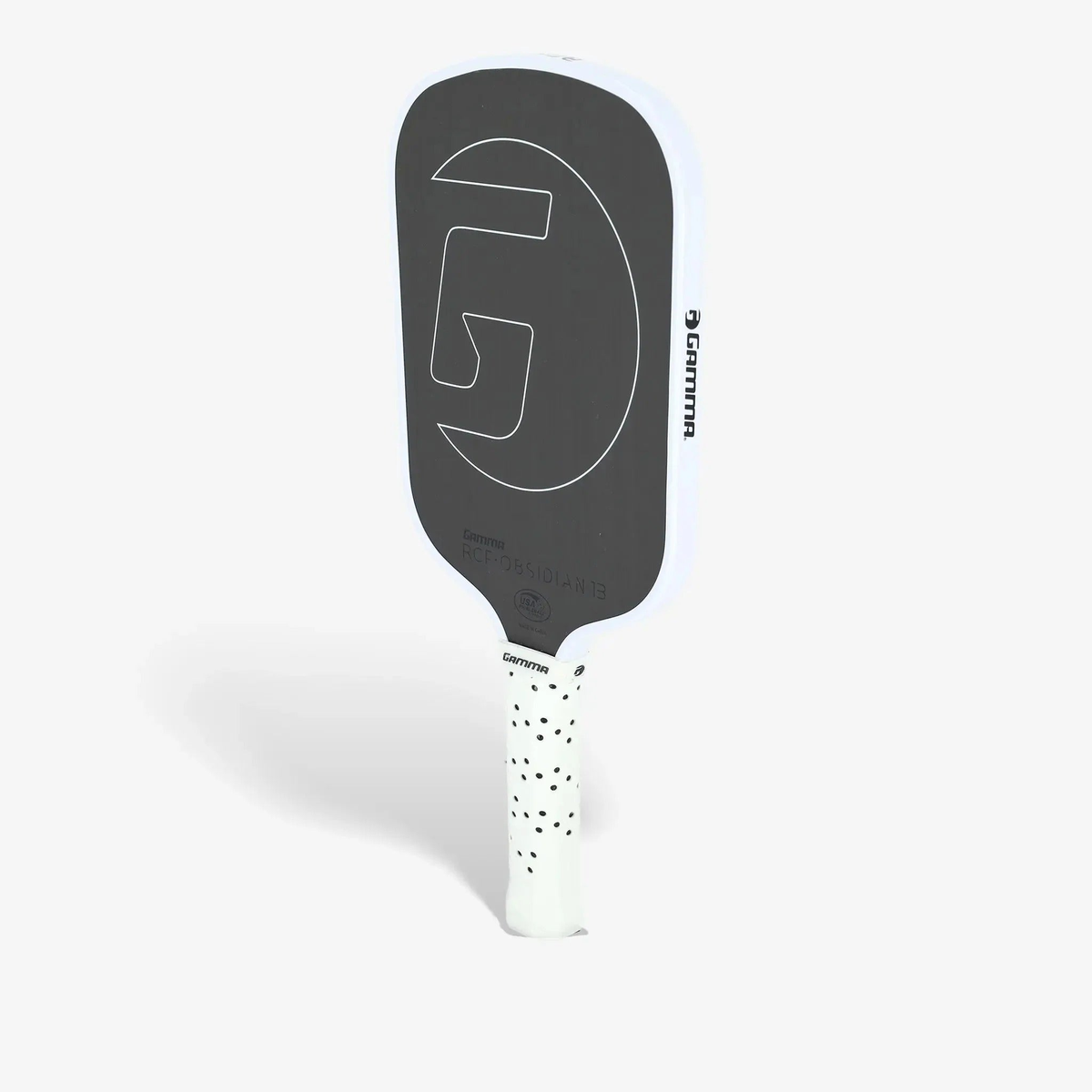 Pickleball paddle with a textured face, wide body shape, and cushioned grip handle designed for control and performance.