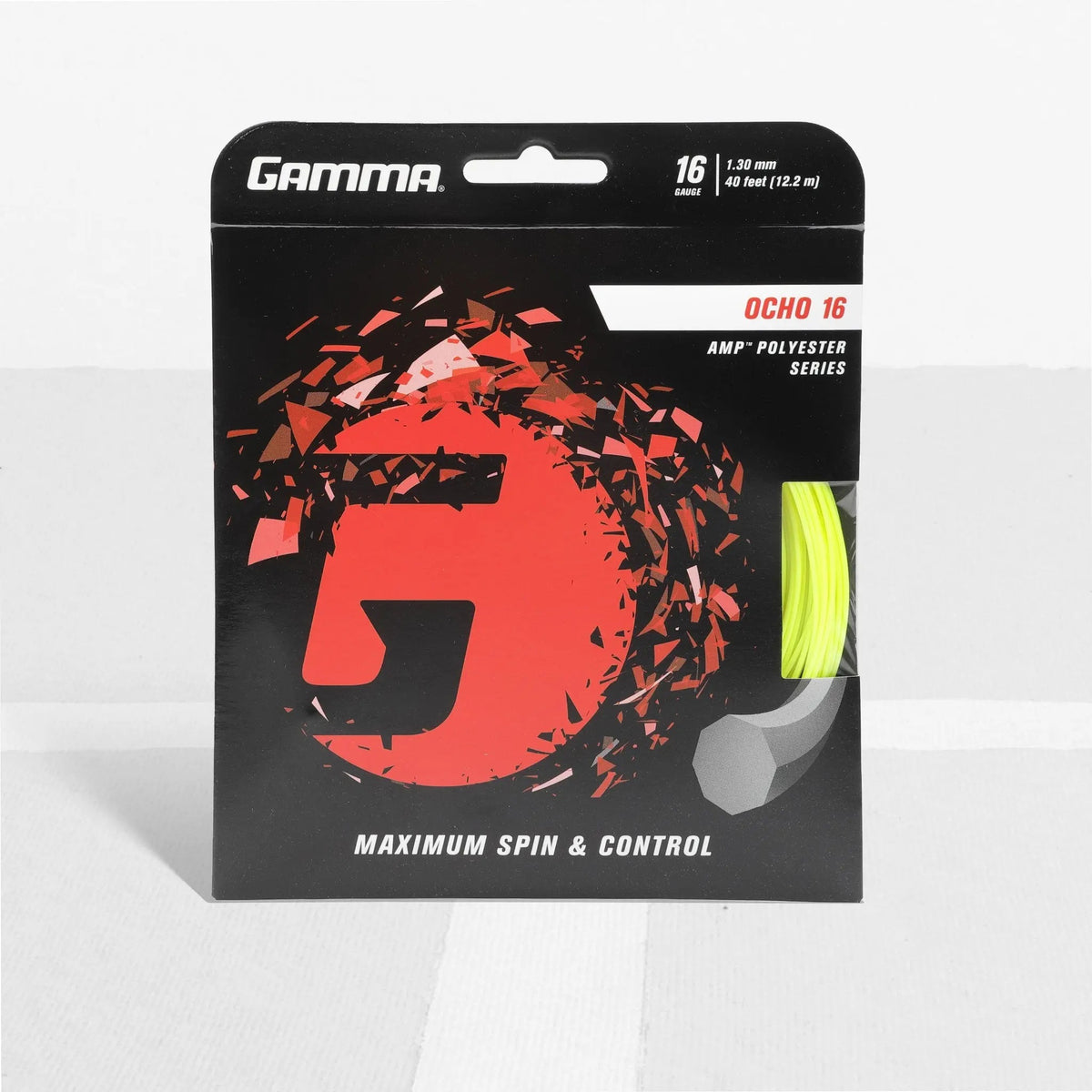 Packaged polyester tennis string set with branded card backing and visible coiled string segment, designed for maximum spin and control.