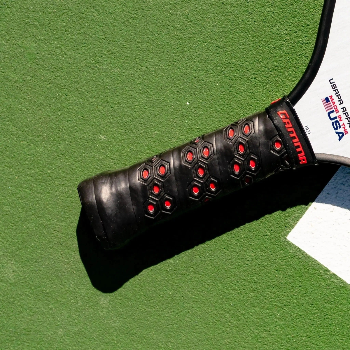 Replacement honeycomb grip for pickleball paddles designed to provide enhanced tack, control, and a firm feel.