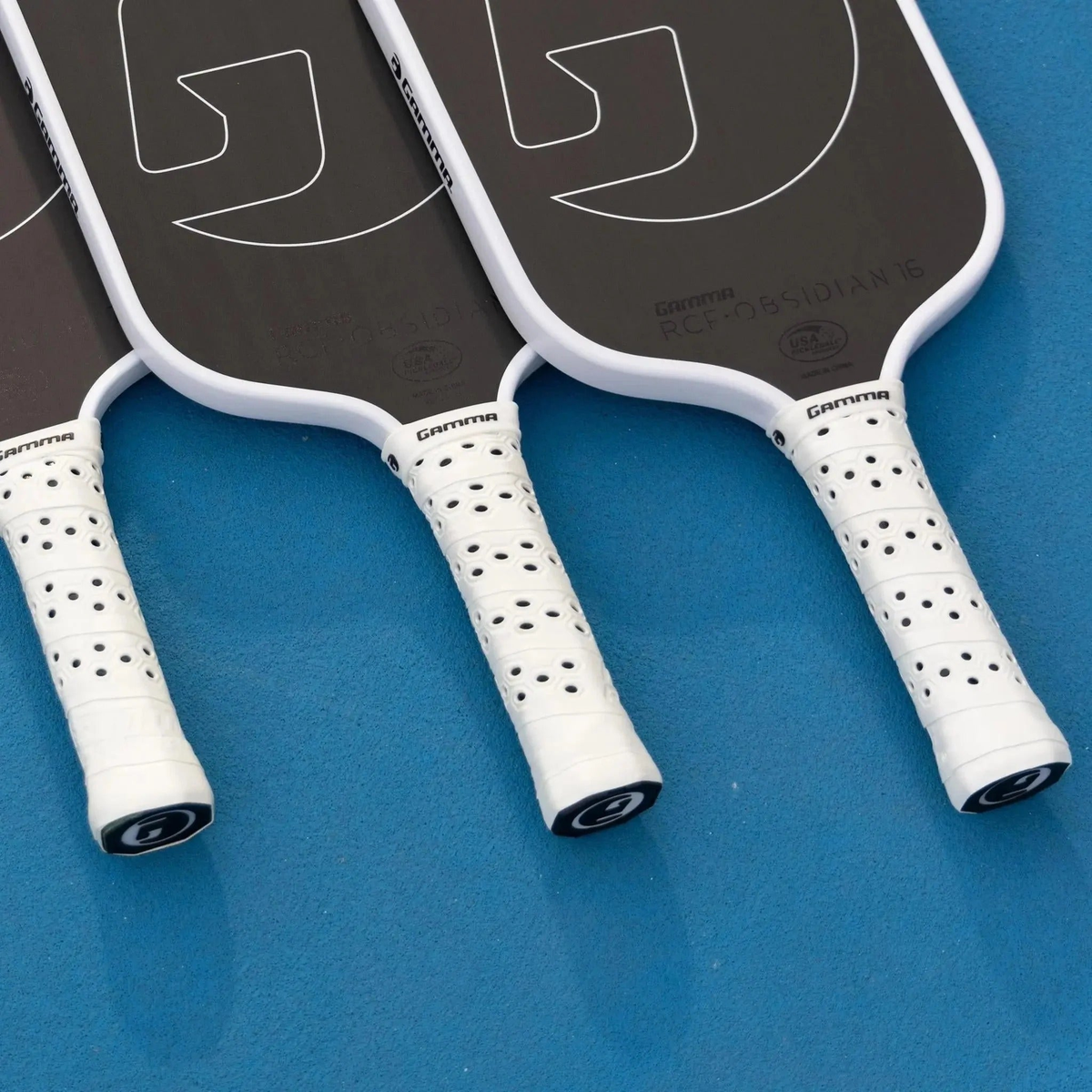 Replacement honeycomb grip for pickleball paddles designed to provide enhanced tack, control, and a firm feel.