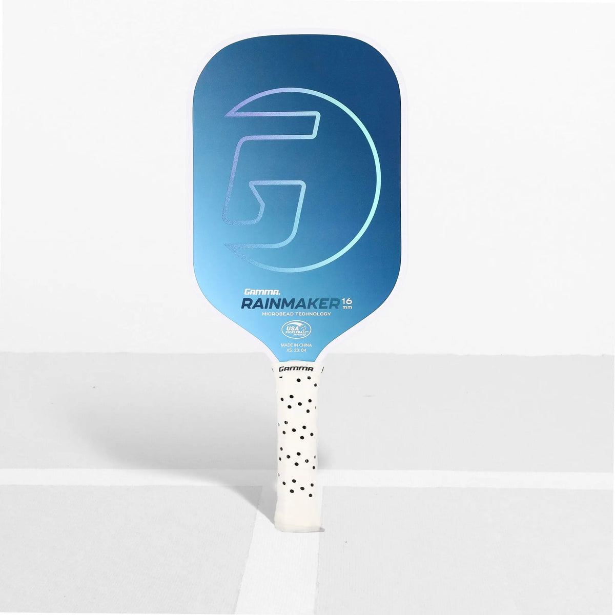 Pickleball paddle featuring a textured face and ergonomic handle, designed for control and performance during play.