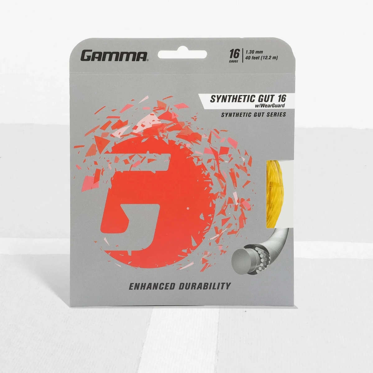 Tennis racket synthetic gut string set with wear-resistant construction in retail packaging, designed for enhanced durability and performance.