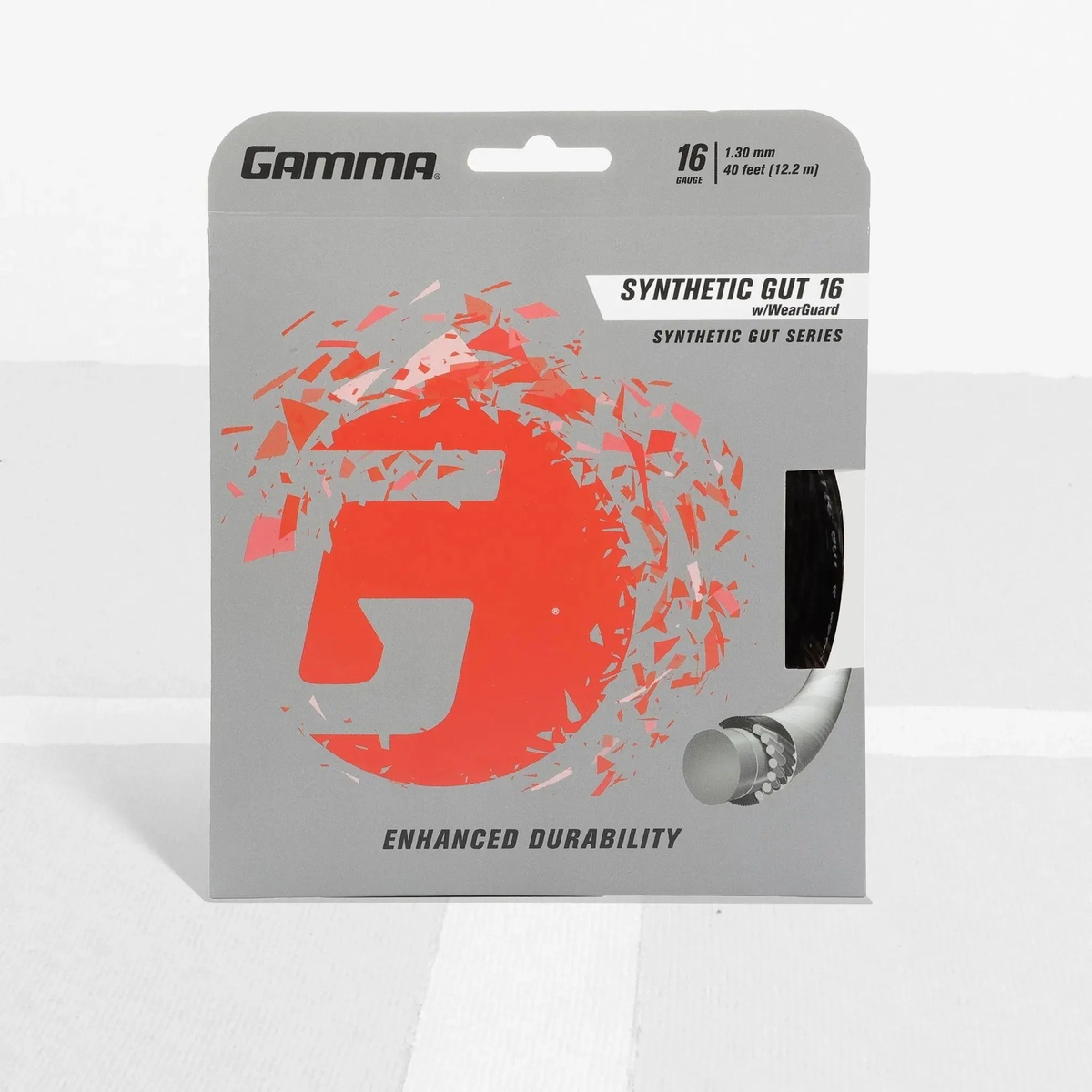 Tennis racket synthetic gut string set with wear-resistant construction in retail packaging, designed for enhanced durability and performance.