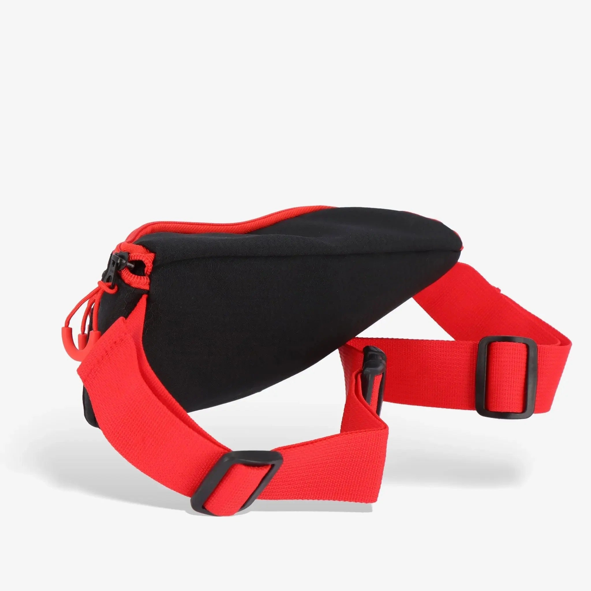Sport fanny pack with adjustable strap and zippered compartments, designed for convenient storage of personal items during activities.