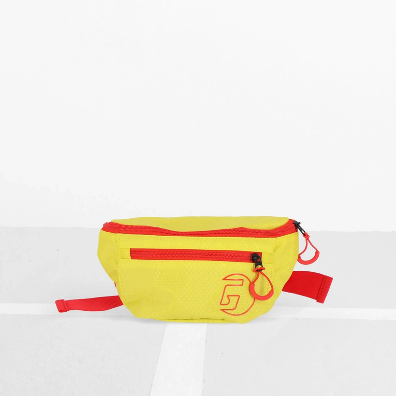 Sport fanny pack with adjustable strap and zippered compartments, designed for convenient storage of personal items during activities.