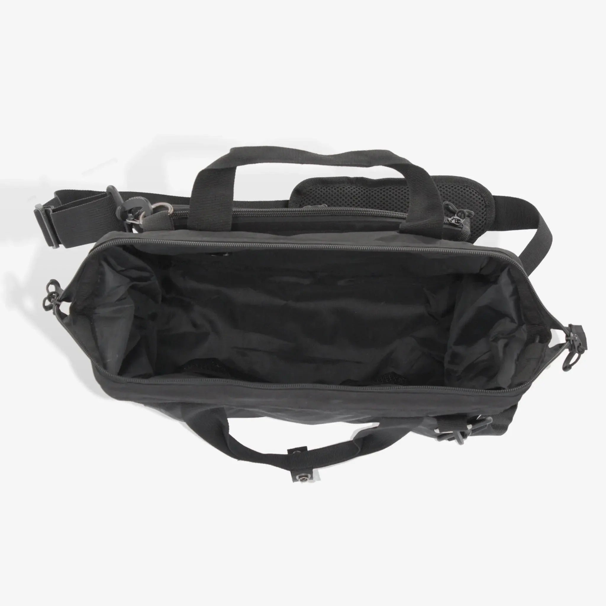 Sport tote bag with carry handles and shoulder strap, featuring multiple zippered compartments and a side pocket for holding a water bottle or gear.