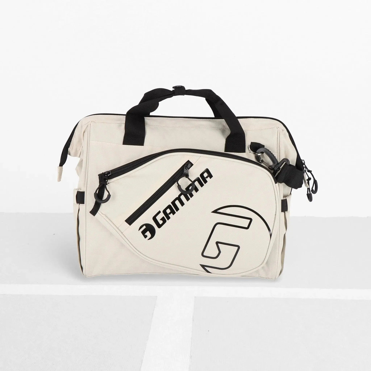 Sport tote bag with carry handles and shoulder strap, featuring multiple zippered compartments and a side pocket for holding a water bottle or gear.