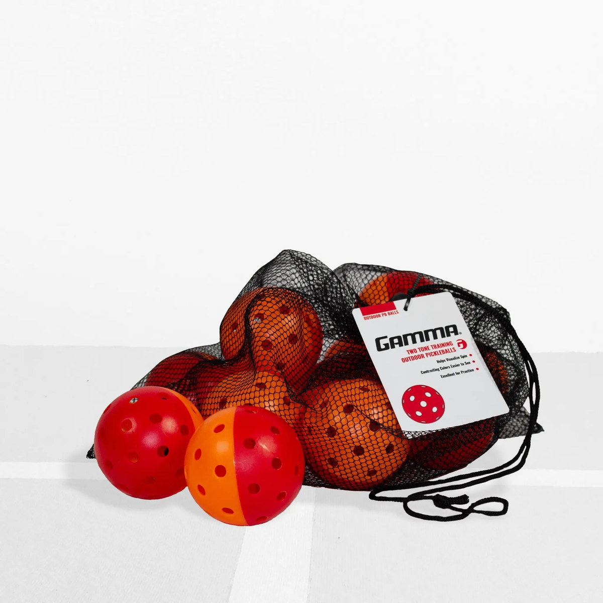 Outdoor pickleball with a two-tone design and evenly spaced holes, designed for training and practice play.