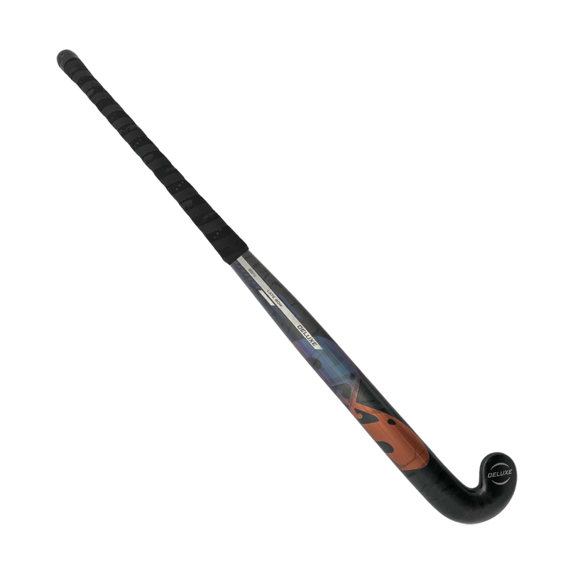 TK Deluxe Late Bow field hockey stick in black with matte finish and bronze graphic accents