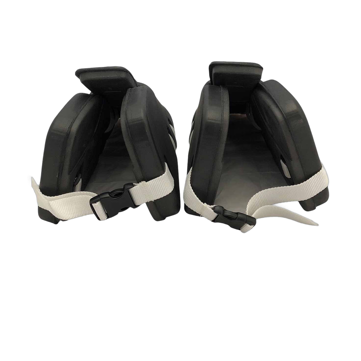TK3 field hockey goalkeeper kickers featuring a durable foam construction, raised toe design, and adjustable buckle straps for a secure fit and controlled rebound.