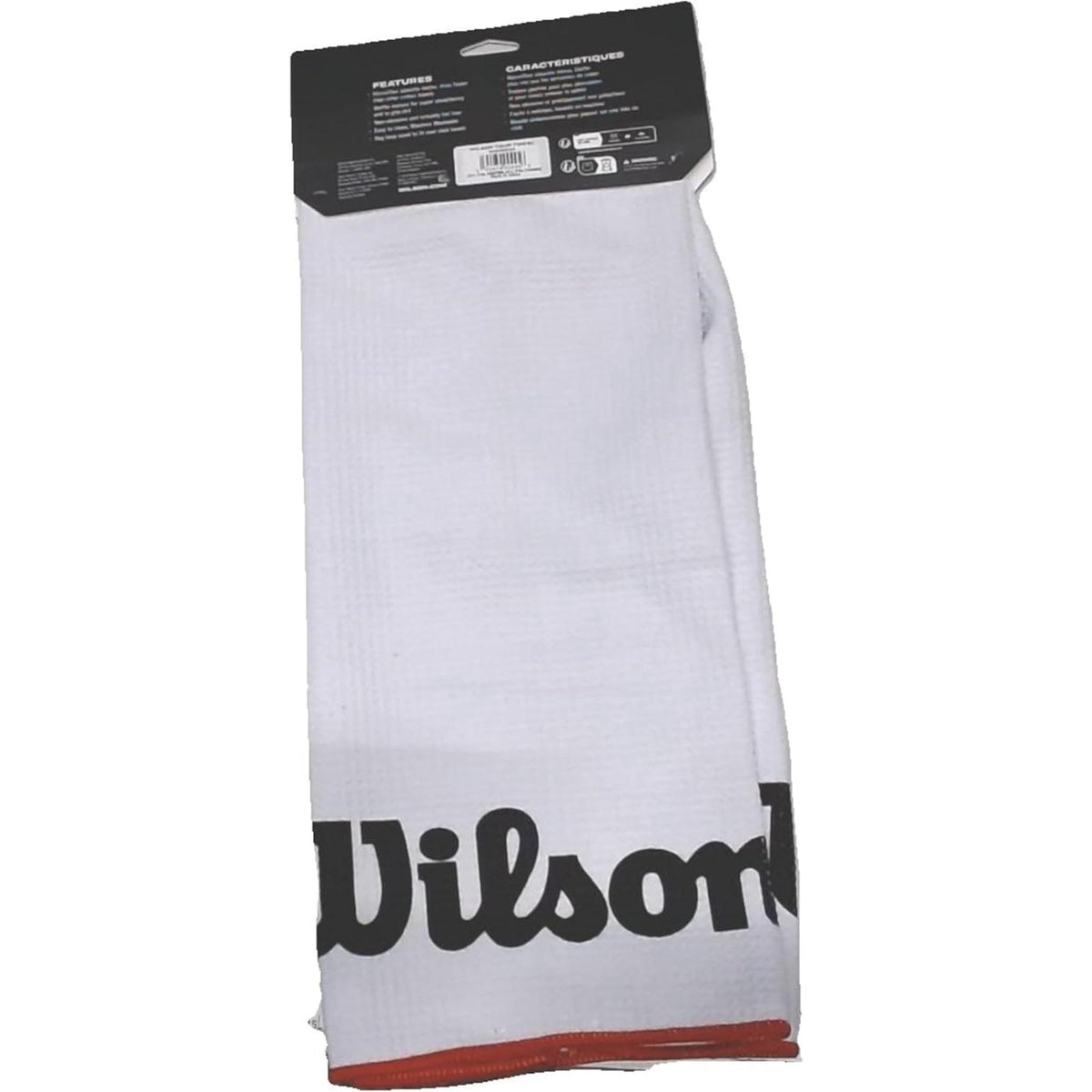 Wilson Golf Tour towel in white with large black Wilson logo and red trim, designed for cleaning golf clubs and balls, shown in retail packaging on a white background.