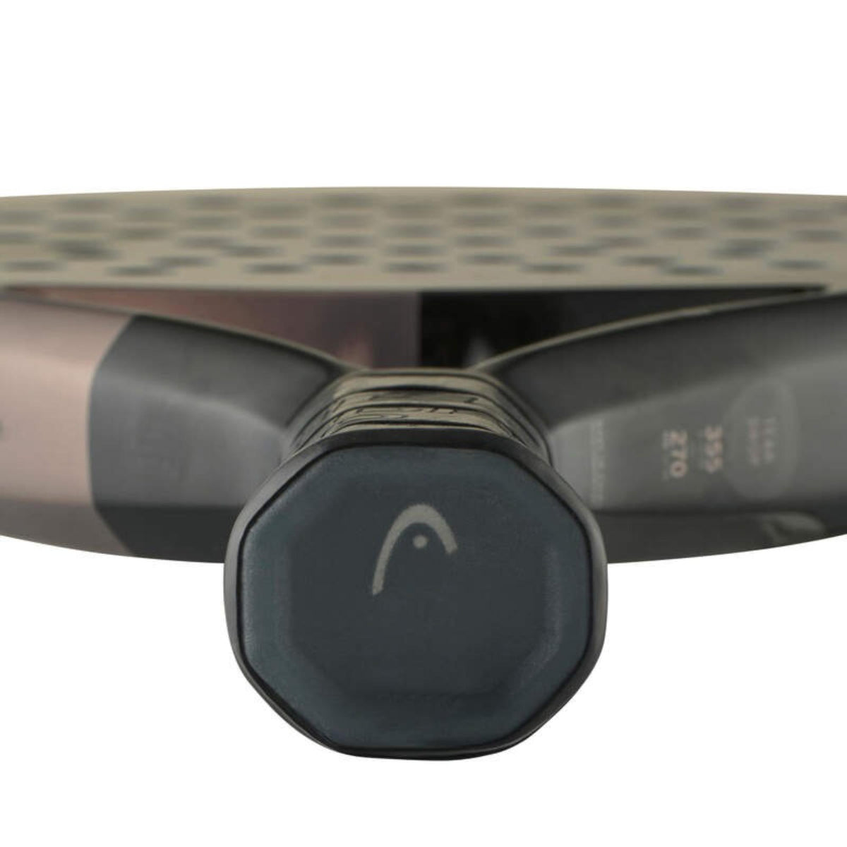 Close-up of the handle base cap of a rose-colored Head Speed padel racket with Head logo.