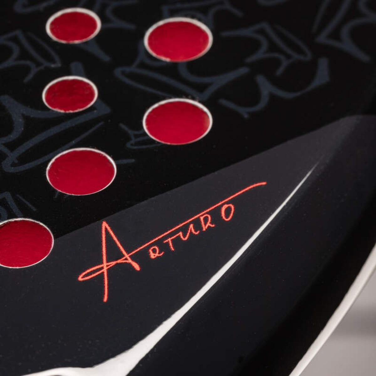 Head Coello Team Arturo padel racket in navy and black with white logo and red signature, front view on white background.