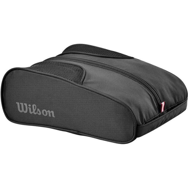 Wilson Golf tour shoe bag in black featuring a zippered main compartment, mesh ventilation panels, and Wilson logo on the front.