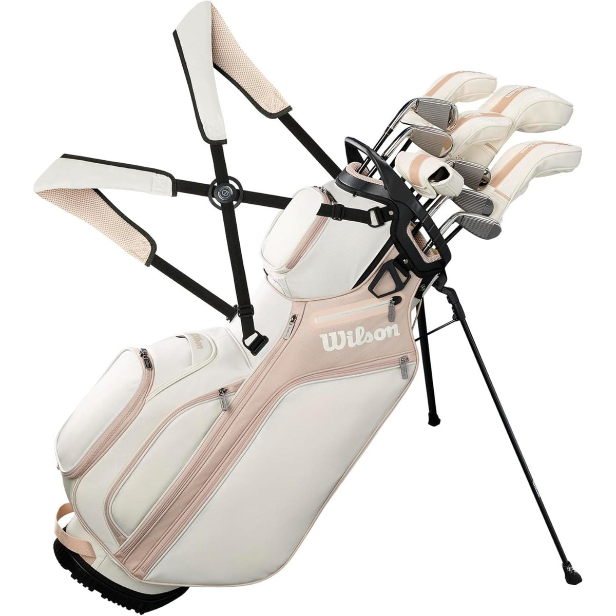 Wilson Golf Women’s Aurora complete golf club set with stand bag in white and blush pink, featuring multiple clubs, padded dual shoulder straps, and built-in stand legs.