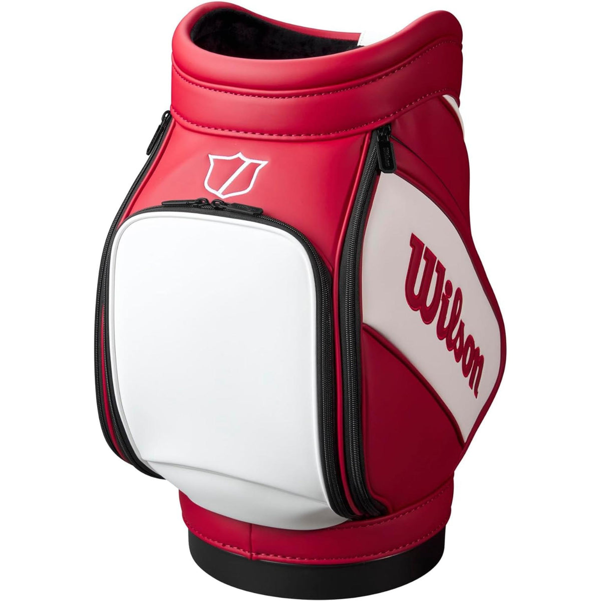 Wilson Golf Tour Range Caddie bag in red and white with large Wilson logo, compact design, and zippered storage pocket, shown on a white background.