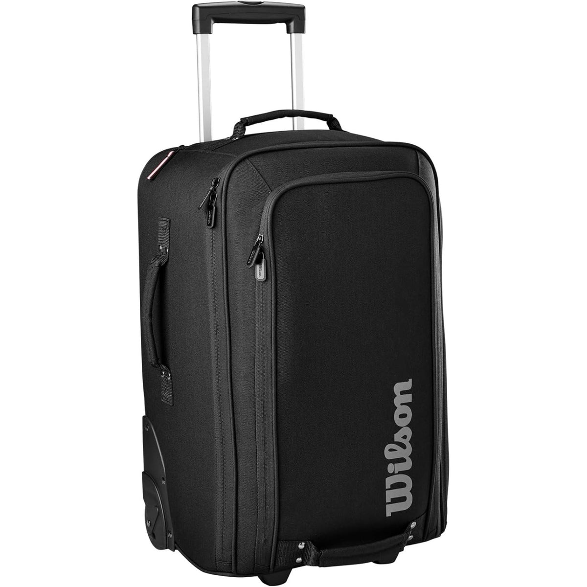 Wilson Golf Tour carry-on luggage in black with multiple zippered compartments, durable fabric construction, and vertical Wilson logo, designed for travel and golf gear storage.